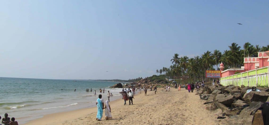 a beautiful beach with crowds